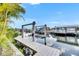 View of a boat lift on a canal, providing direct access to the water at 6526 Simone Shores Cir, Apollo Beach, FL 33572
