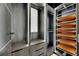 Custom closet with drawers and shelves for organized storage, along with LED lighting at 6526 Simone Shores Cir, Apollo Beach, FL 33572