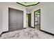 Hallway with sleek doors and modern design with doorways to other rooms at 6526 Simone Shores Cir, Apollo Beach, FL 33572