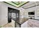 Gourmet kitchen with stainless steel appliances, sleek cabinetry, and a center island at 6526 Simone Shores Cir, Apollo Beach, FL 33572