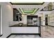 Modern kitchen features sleek countertops, stainless steel appliances, and custom cabinetry at 6526 Simone Shores Cir, Apollo Beach, FL 33572