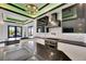 This kitchen features stainless steel appliances, modern countertops and designer backsplash at 6526 Simone Shores Cir, Apollo Beach, FL 33572
