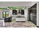 Stylish kitchen with modern appliances, a spacious island, and plenty of counter space at 6526 Simone Shores Cir, Apollo Beach, FL 33572