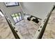 View of the open floor plan featuring a modern kitchen and living area with high ceilings at 6526 Simone Shores Cir, Apollo Beach, FL 33572