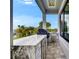 Covered outdoor kitchen featuring premium grill and countertop, ideal for entertaining guests at 6526 Simone Shores Cir, Apollo Beach, FL 33572