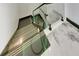 Modern staircase with glass railings and unique lighting accents at 6526 Simone Shores Cir, Apollo Beach, FL 33572