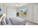 Cozy bedroom features natural light, closet space and relaxing atmosphere for a serene retreat at 6604 2Nd Ne Ave, Bradenton, FL 34208