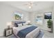 Bright bedroom features contemporary decor, a comfortable bed, and ample natural light for a tranquil space at 6604 2Nd Ne Ave, Bradenton, FL 34208
