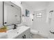 Stylish bathroom featuring modern fixtures, a sleek vanity, and a walk-in shower at 6804 Tierra Verde St, Port Richey, FL 34668