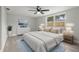 Staged bedroom featuring a comfortable bed and modern decor at 6804 Tierra Verde St, Port Richey, FL 34668