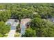 Charming single-Gathering home with mature trees, a well-manicured lawn, and a two-car garage at 6918 Potomac Cir, Riverview, FL 33578