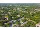 A beautiful aerial view features homes near a lush green landscape and a community park at 6918 Potomac Cir, Riverview, FL 33578