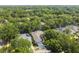 Charming single-Gathering home with mature trees, a well-manicured lawn, and a two-car garage at 6918 Potomac Cir, Riverview, FL 33578