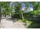 View of the backyard with perimeter fence and foliage at 6918 Potomac Cir, Riverview, FL 33578