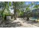 View of backyard with shed, soccer net, and pool area at 6918 Potomac Cir, Riverview, FL 33578