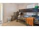 Bedroom featuring bunk beds, carpet, and a ceiling fan at 6918 Potomac Cir, Riverview, FL 33578