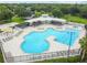Aerial view of a community pool with many amenities in a well-maintained landscape at 6918 Potomac Cir, Riverview, FL 33578