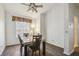Bright dining room with modern lighting, wood floors, and neutral walls at 6918 Potomac Cir, Riverview, FL 33578