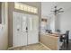 Welcoming entryway with a view into the dining area, featuring stylish tiled floors at 6918 Potomac Cir, Riverview, FL 33578