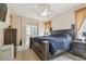 Spacious main bedroom with large window and ceiling fan at 6918 Potomac Cir, Riverview, FL 33578