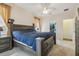 Bedroom with large window, ceiling fan and closet at 6918 Potomac Cir, Riverview, FL 33578