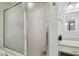 Shower with glass door at 6918 Potomac Cir, Riverview, FL 33578
