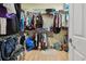 Ample storage in the walk-in closet with shelving and hanging space at 6918 Potomac Cir, Riverview, FL 33578