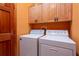Laundry room featuring a washer and dryer at 6928 Cozumel Ct, Land O Lakes, FL 34637