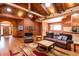 Inviting living room featuring wood floors, beamed ceilings, skylights and an open concept design at 6928 Cozumel Ct, Land O Lakes, FL 34637