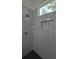 Modern shower with white tiled walls, rainfall shower head, and built-in niche at 7011 N 15Th St, Tampa, FL 33610