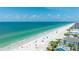 Breathtaking aerial view of a wide sandy beach and serene turquoise ocean waters at 722 Gulf Blvd, Indian Rocks Beach, FL 33785