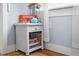 The bedroom features a white wicker side table with games and seaside decor at 722 Gulf Blvd, Indian Rocks Beach, FL 33785