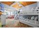 Comfortable bedroom boasts bunk beds, a unique rug, and charming coastal decorations at 722 Gulf Blvd, Indian Rocks Beach, FL 33785