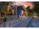 Adorable beach cottage with a cute fence and pathway at 722 Gulf Blvd, Indian Rocks Beach, FL 33785