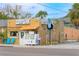Quaint beachside eatery with bamboo facade and inviting blue chairs at 722 Gulf Blvd, Indian Rocks Beach, FL 33785