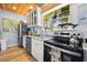 Well-equipped kitchen with stainless steel appliances, granite countertops, and ample cabinet space at 722 Gulf Blvd, Indian Rocks Beach, FL 33785