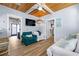 This living room features hardwood floors and light blue walls at 722 Gulf Blvd, Indian Rocks Beach, FL 33785
