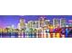 Beautiful city skyline view at night, reflecting on the water at 746 Masterpiece Dr, Sun City Center, FL 33573