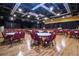 Spacious event hall with rows of round tables and chairs for large gatherings at 746 Masterpiece Dr, Sun City Center, FL 33573