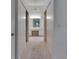 Hallway view to vanity and sink at 746 Masterpiece Dr, Sun City Center, FL 33573