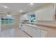Bright kitchen with modern appliances and generous counter space and an eat-in area at 746 Masterpiece Dr, Sun City Center, FL 33573
