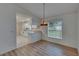 Kitchen and dining area with modern appliances and ample natural light at 746 Masterpiece Dr, Sun City Center, FL 33573