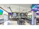 Spacious restaurant featuring a full bar, high ceilings, and multiple TVs for entertainment at 746 Masterpiece Dr, Sun City Center, FL 33573