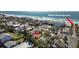 Aerial view of a charming home near a public beach access point and a private swimming pool at 819 Gulf Blvd, Indian Rocks Beach, FL 33785