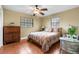 Charming bedroom with natural light, neutral paint and lots of space at 819 Gulf Blvd, Indian Rocks Beach, FL 33785