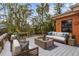 Outdoor deck featuring a seating area with sofa and chairs at 819 Gulf Blvd, Indian Rocks Beach, FL 33785