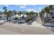 Charming single-story buildings with classic architectural style, lush landscaping, and prime location by the beach at 819 Gulf Blvd, Indian Rocks Beach, FL 33785