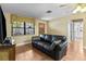 Inviting living room featuring a large window for natural light and neutral color scheme at 819 Gulf Blvd, Indian Rocks Beach, FL 33785