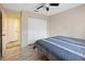 Bedroom with a built-in closet, doorway to another room, and a queen-sized bed at 8436 60Th N St # 304, Pinellas Park, FL 33781