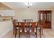 Cozy dining area with seating for six, perfect for Gathering meals or dinner parties at 8436 60Th N St # 304, Pinellas Park, FL 33781